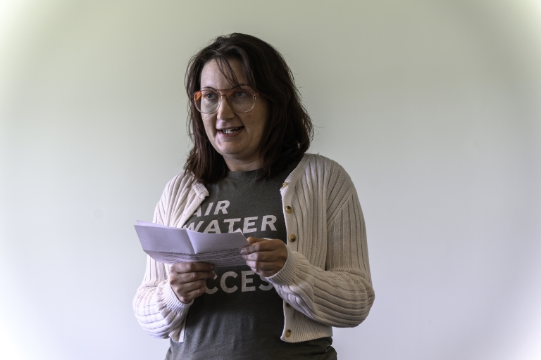 Sam Shepherd, grants and communications manager at Southside Community Land Trust, speaks.
