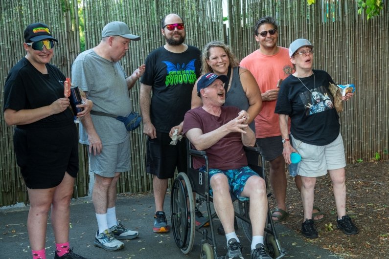 A group of guests poses for a photo.