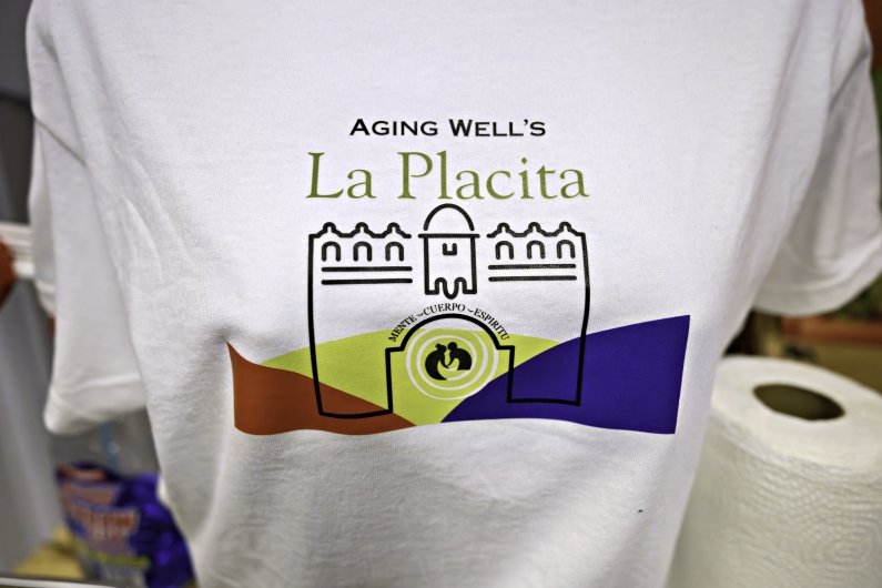 A T-shirt with the La Placita name and logo.