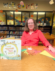 Michaela Davin with a turkey craft for the book "The Thank You Dish"