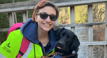 Brooke Coelho and her service dog, Davos.