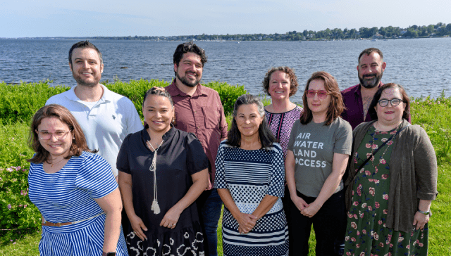 The 2025 mini grant awardees pose with Sherlock Center staff outside Save The Bay in Providence.